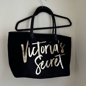 Victoria’s Secret black bag with gold lettering
